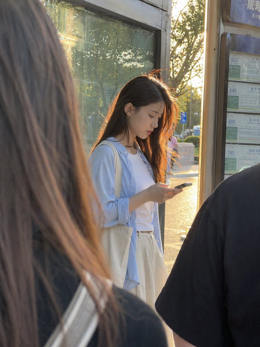 Golden Hour Bus Stop Candid - GPT Image 2 prompt example